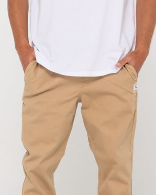 Man wearing Mid Boy Straight Fit Elastic Pant in Khaki