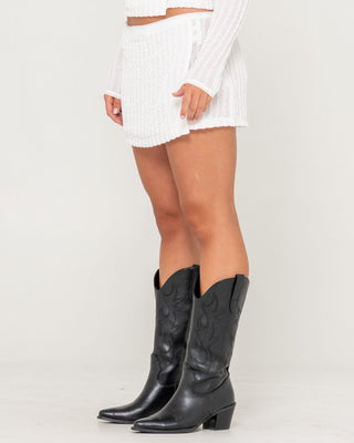 Woman wearing I Kissed A Pearl Lace Wrap Mini Skirt in White