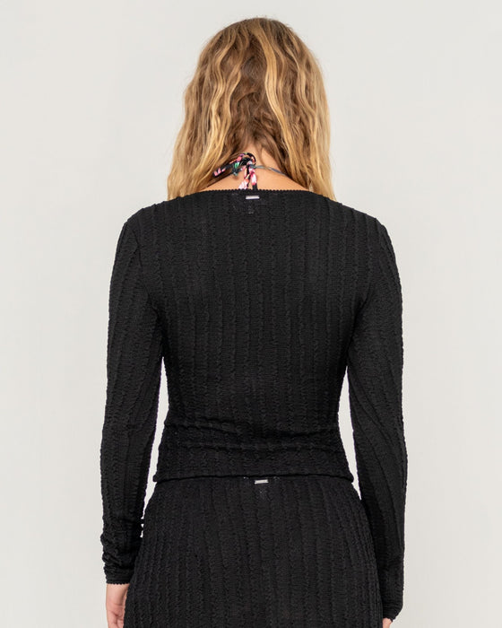 woman-wearing-i-kissed-a-pearl-lace-wrap-l-s-top-in-black