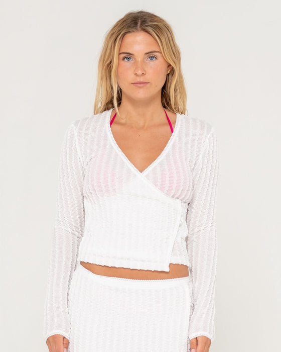 woman-wearing-i-kissed-a-pearl-lace-wrap-l-s-top-in-white