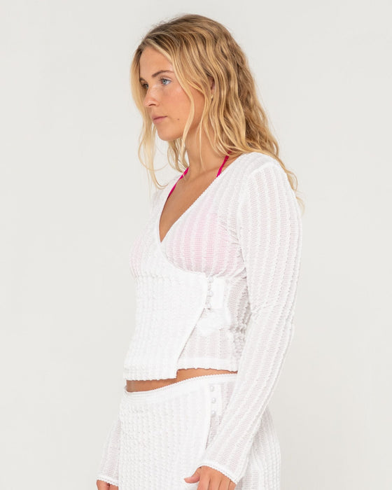 woman-wearing-i-kissed-a-pearl-lace-wrap-l-s-top-in-white