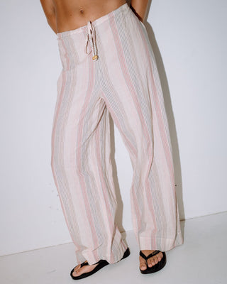 Woman wearing Goa Stripe Beach Pant in Multi Stripe