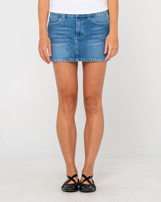 woman-wearing-flip-mommy-low-rise-mini-denim-skirt-in-blasted-middy-blue-blue