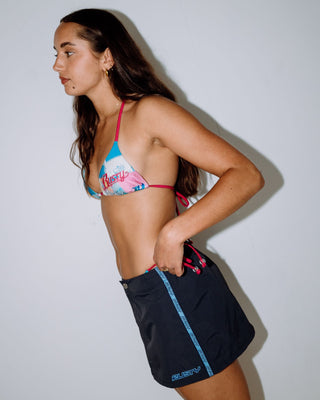 Woman wearing Lombardi Nylon Mini Skirt in Navy