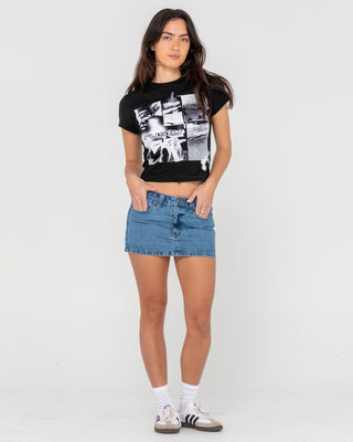 Woman wearing Mavericks Low Rise Denim Mini Skirt in Middy Blue