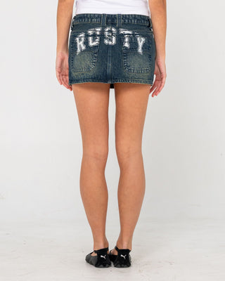 Woman wearing Norty Low Rise Denim Micro Mini Skirt in Dark N Dirty