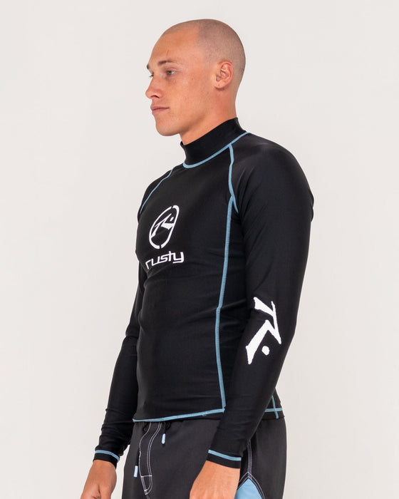 man-wearing-gnaraloo-long-sleeve-surf-top-in-black