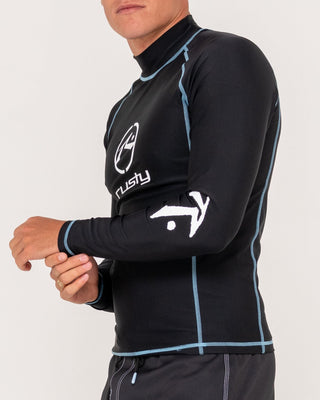 Man wearing Gnaraloo Long Sleeve Surf Top in Black