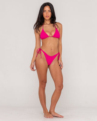 Woman wearing Sandalwood Midi Side Ties Bikini Bottom in Fuchsia