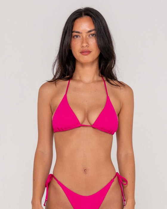 woman-wearing-sandalwood-multiway-bikini-top-in-fuchsia