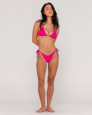 Woman wearing Sandalwood Multiway Bikini Top in Fuchsia