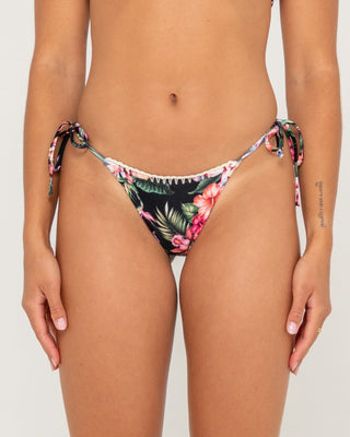 Woman wearing Heidi Floral Midi Ties Bikini Bottom in Black