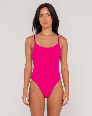 Woman wearing Sandalwood Hi Leg One Piece in Fuchsia