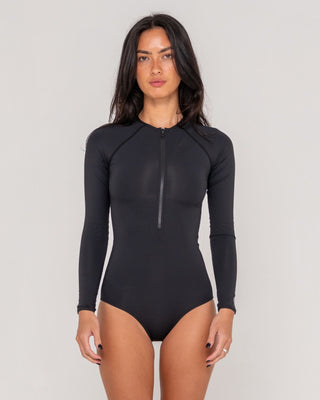 Woman wearing R2K Front Zip Long Sleeve Surf Suit in Black
