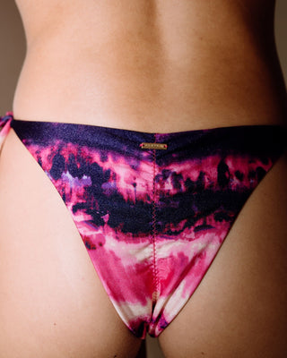 Woman wearing 2 Dye 4 Brazilian Rouched Bikini Bottom in Pink Tie Dye