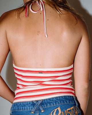 Woman wearing Emma Cut Out Skimmer Tank in Red