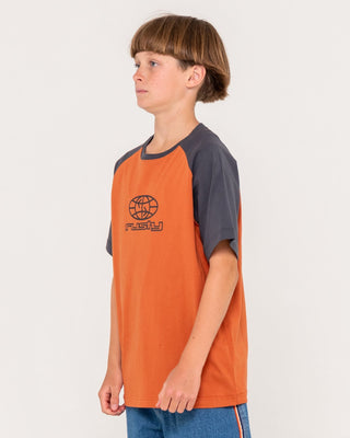 Boy wearing Wagwan Raglan Short Sleeve Tee Boys in Burnt Orange