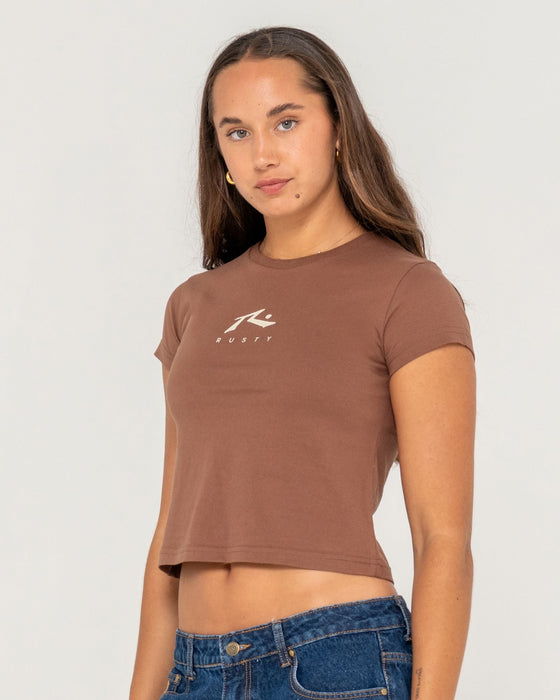 woman-wearing-rusty-essentials-relaxed-mini-tee-in-pinecone