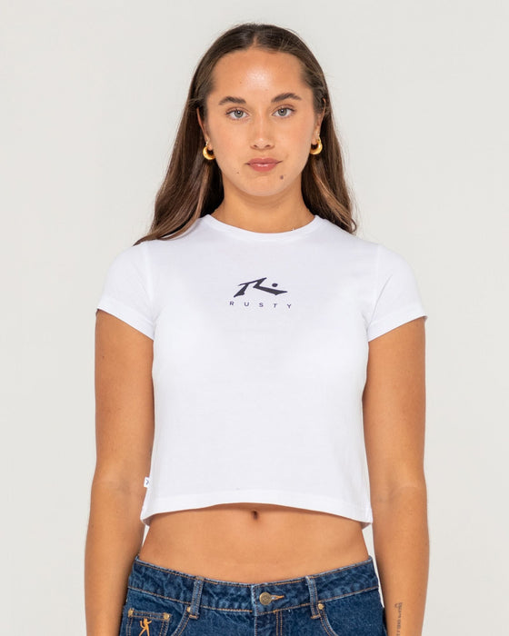 woman-wearing-rusty-essentials-relaxed-mini-tee-in-white