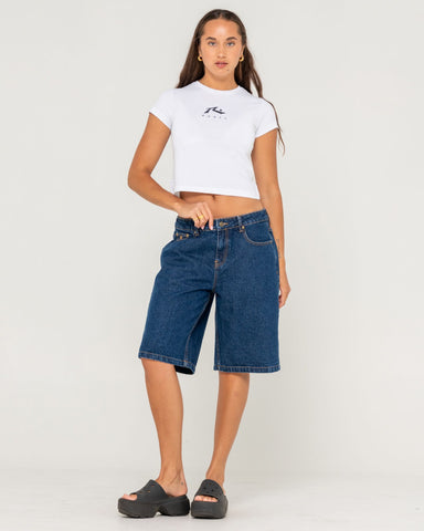 Woman wearing Rusty Essentials Graphic Baby Tee in White - midweight and relaxed fit