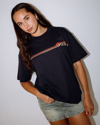 Woman wearing Wave Rider 2.0 Oversized Graphic Tee in Blue - midweight tee