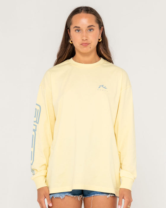 woman-wearing-play-it-safe-l-s-tee-in-pale-banana