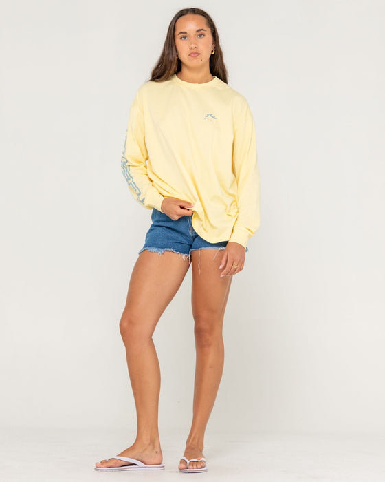 woman-wearing-play-it-safe-l-s-tee-in-pale-banana