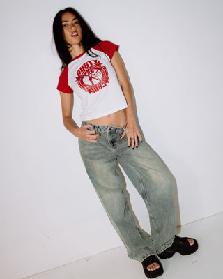 Woman wearing Daring Devil Cap Sleeve Baby Tee in White