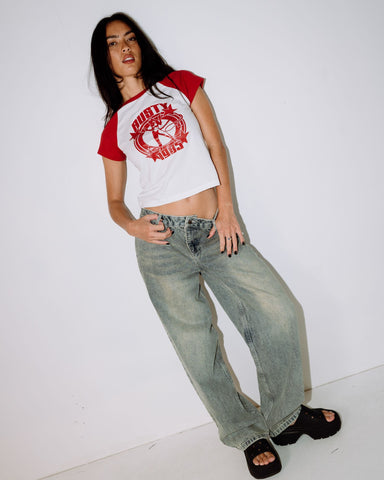 Woman wearing Daring Devil Cap Sleeve Baby Tee in White