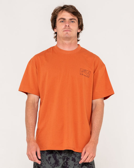 man-wearing-boxed-out-short-sleeve-tee-in-burnt-orange