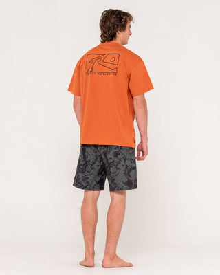 Man wearing Boxed Out Short Sleeve Tee in Burnt Orange