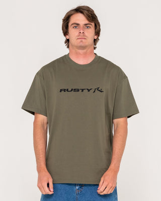 Man wearing Vital Rusty Short Sleeve Tee in Savanna