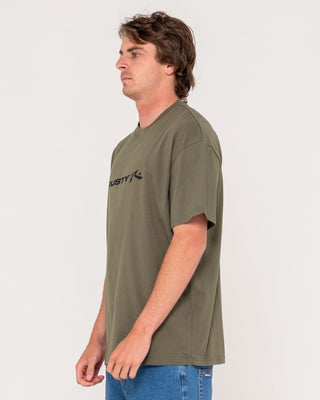 Man wearing Vital Rusty Short Sleeve Tee in Savanna