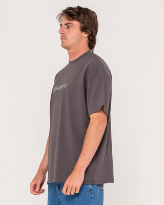 Man wearing Flip Daddy Short Sleeve Tee in Coal