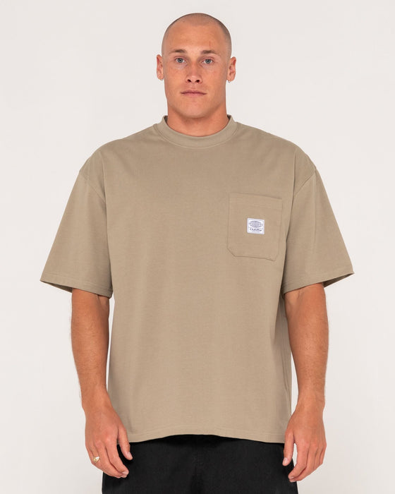 man-wearing-steezey-short-sleeve-heavy-tee-in-khaki