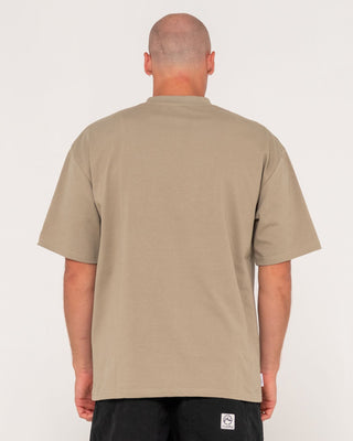 Man wearing Steezey Short Sleeve Heavy Tee in Khaki