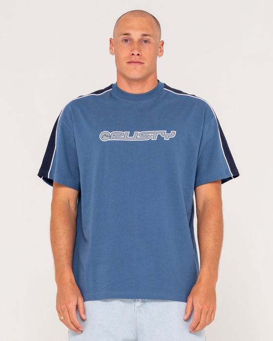 man-wearing-alonso-short-sleeve-tee-in-china-blue