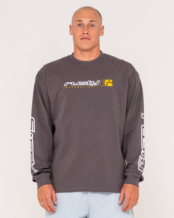 man-wearing-jetsetter-long-sleeve-tee-in-coal