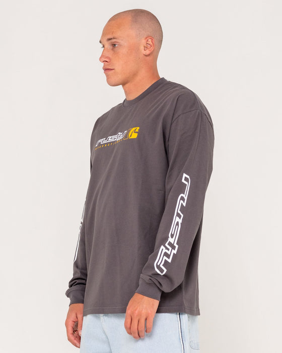 man-wearing-jetsetter-long-sleeve-tee-in-coal