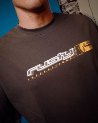 Man wearing Jetsetter Long Sleeve Tee in Coal