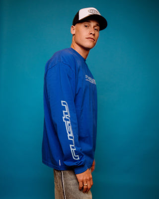 Man wearing Jetsetter Long Sleeve Tee in Royal Blue