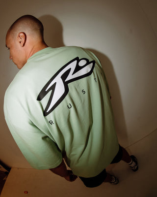 Man wearing Registered Short Sleeve Tee in Smoke Green
