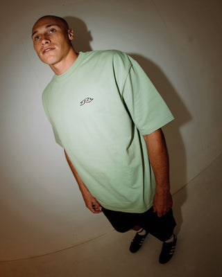 Man wearing Registered Short Sleeve Tee in Smoke Green
