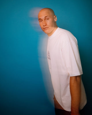 Man wearing Double Or Nothin Short Sleeve Tee in White