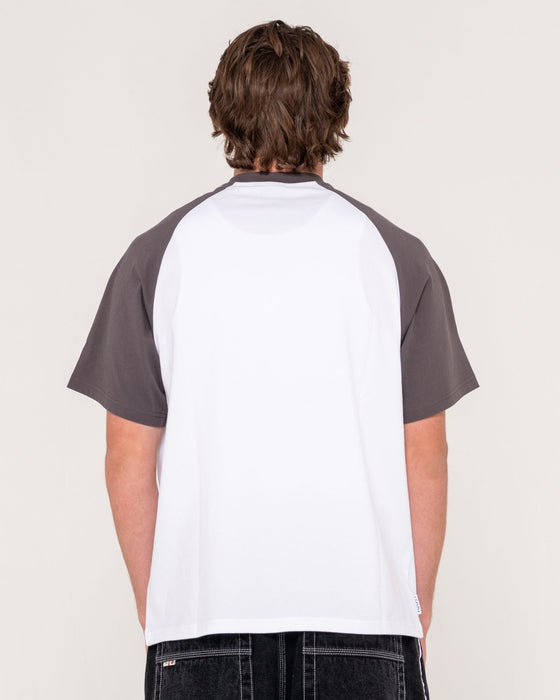 man-wearing-rambo-raglan-short-sleeve-tee-in-white