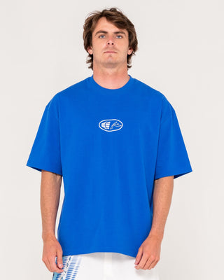 Man wearing Outer There Short Sleeve Heavy Tee in Royal Blue