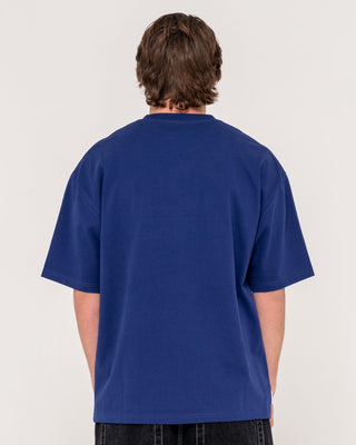 Man wearing Crusoe Short Sleeve Heavy Tee in Dark Blue