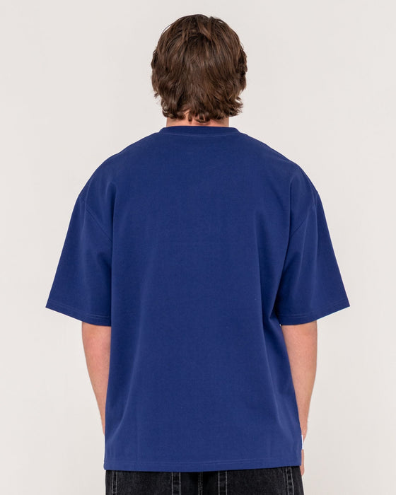 man-wearing-crusoe-short-sleeve-heavy-tee-in-dark-blue