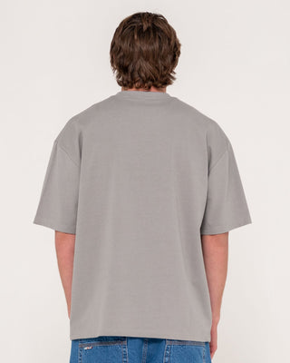 Man wearing Crusoe Short Sleeve Heavy Tee in Ultimate Grey