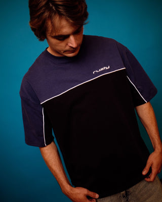 Man wearing Oblivion 2.0 Heavy Short Sleeve Tee in Black